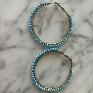 Blue beaded hoop earrings